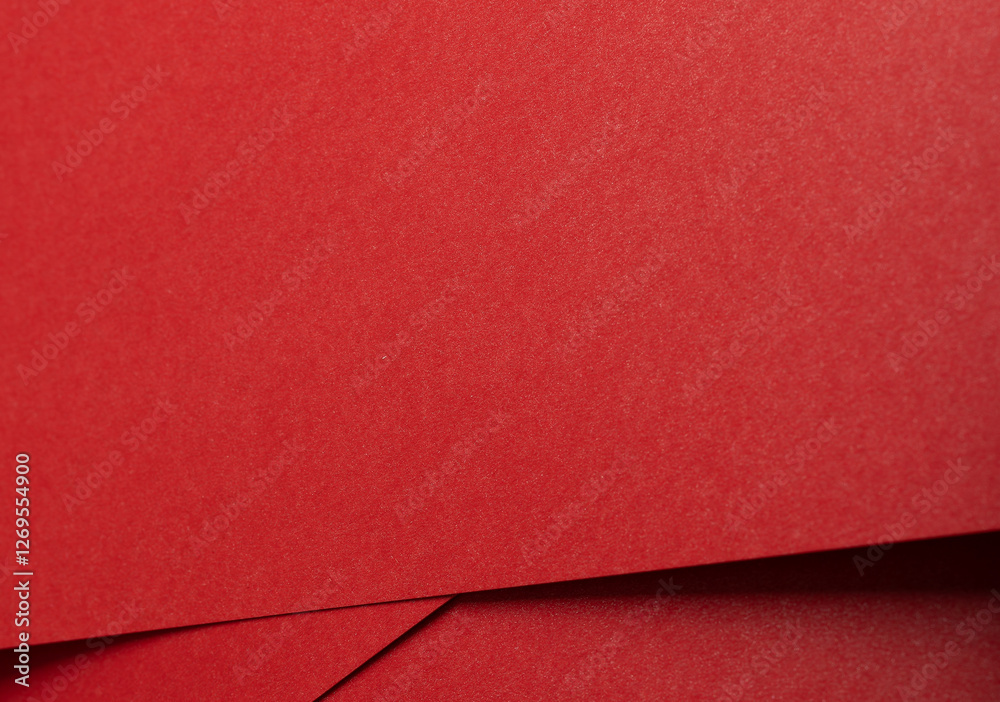Poster Fiery crimson paper background with a fine grainy texture and layered folds. Rich ruby and scarlet tones abstract design with dynamic contrast.