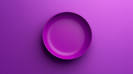 Fototapeta premium A vibrant purple plate centered on a matching purple background, creating a minimalist and modern aesthetic.
