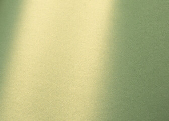 Pastel olive green paper background with a pearlescent, glossy texture and shimmering reflections. Soft sage and moss tones