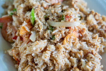 Fried rice with crab and shrimp served on plate