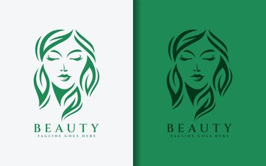 A modern logo of a beautiful woman's face elegantly combined with flowing leaf elements in a minimalist design. Symbolizing nature and beauty.