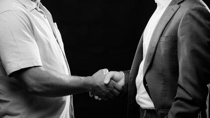 two men shaking hands
