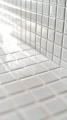 Clean white ceramic mosaic tiles in bathroom corner with soft natural light casting gentle shadows, creating minimalist geometric pattern and peaceful atmosphere.