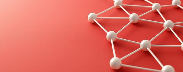 A close-up view of a white molecular structure on a red background, illustrating connections and scientific concepts.
