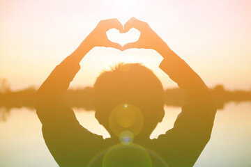 boy hands holding hearts silhouette	