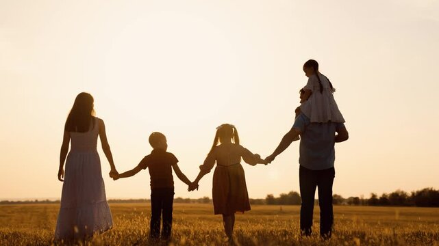 happy family child kid baby together teamwork dream fly children's dream silhouette sunset field park sun father mother, nature walk family, big family leisure, sunset holding hands, golden hour