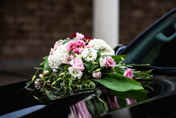 Wedding car adorned with beautiful flowers