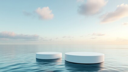 Floating white podiums on ocean at sunrise