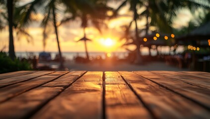 Wooden table on beach at sunset, blurred background