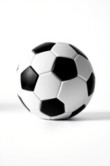 Naklejka premium Classic Black and White Soccer Ball on White Background