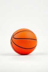 Fototapeta premium Orange Basketball on White Background Sports Equipment Image