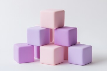 Obraz premium Pastel cubes stacked pyramid on white background