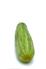Fresh, vibrant green cucumber against a pristine white background