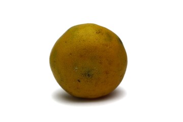 Close-up studio shot of a fresh mandarin orange showing its textured peel detail