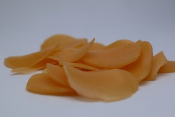 Uncooked Shrimp Crackers Close-Up on White Background Ready To Fry