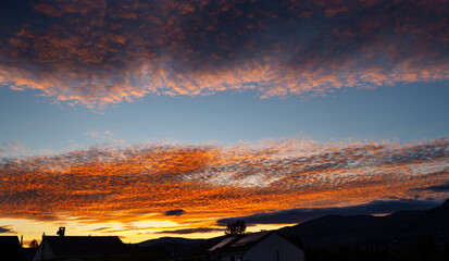Moody sunset sky over montains