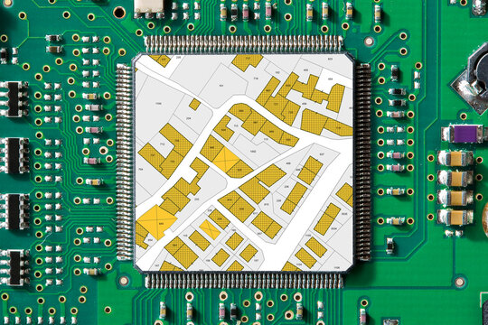 DIGITALIZATION IN LAND ADMINISTRATION - Public cadastral digital databases and information about land records and property registry concept with imaginary cadastral map over an electronic component