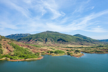 Lake Salagou in Europe, France, Occitanie, Herault, Clermont l Herault, in summer, on a sunny day.