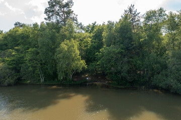 The Gue l eveque pond in Dampierre-en-Burly in Europe, France, Centre Val de Loire, Loiret, Dampierre en Burly, in summer, on a sunny day.