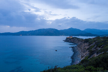 Fototapeta premium Capo Carbonara at night in Cala Caterina in Europe, Italy, Sardinia, Cala Caterina, in summer, on a sunny day.