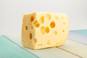 cheese on blue wood background