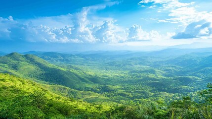 Naklejka premium Panoramic View of Rolling Green Land with Undulating Hills and Sky
