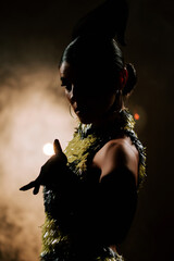 Latina dancer captivates with passionate movements in smoky atmosphere during bachata and samba...