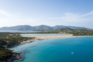 Obraz premium The beach of Porto Giunco in Europe, Italy, Sardinia, Cala Caterina, in summer, on a sunny day.
