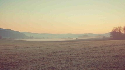 Serene Rural Scene with Land Stretching into Soft Morning Horizon