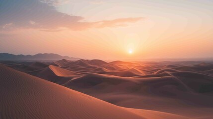 Fototapeta premium Serene Sunset Over Expansive Landscape with Soft Orange Hues