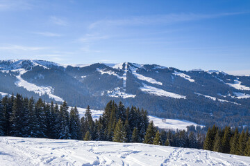 The top of the Alps towards Megeve in Europe, France, Auvergne Rhone Alpes, Haute Savoie, Megeve, in summer, on a sunny day.