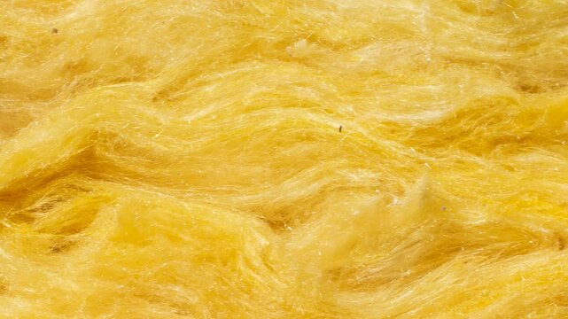 yellow mineral wool with a visible texture