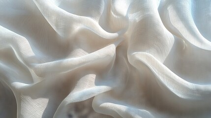 Obraz premium A white clothing tag with a matte, textured finish, positioned on a clean, plain white background and lit with soft, even lighting for a minimalist, modern appearance