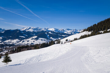 Obraz premium The ski slope in Megeve in Europe, France, Auvergne Rhone Alpes, Haute Savoie, Megeve, in summer, on a sunny day.