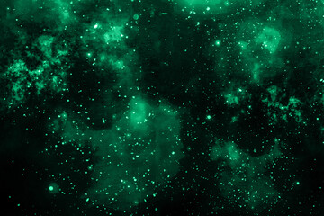 Abstract green glowing cosmic background with scattered particles and nebulae