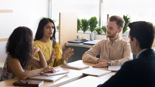 Critical thinking. Smart young female high school student speak on group session share opinion on research subject with male professor diverse polyethnic groupmates propose innovative problem vision