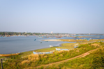 The harbor seen from the fortifications at Kannur in Asia, India, Kerala, Kannur, in summer, on a sunny day.