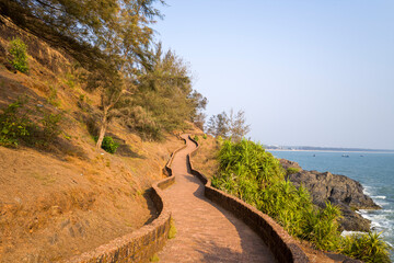 The walking path in the fort at Bekal in Asia, India, Kerala, Bekal, in summer, on a sunny day.