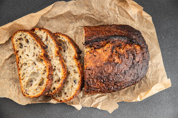Bread cereal sunflower, chia, flax seed, cut oats fresh tasty food dish delicious gourmet food background on the table rustic food top view copy space vegetarian and vegan food