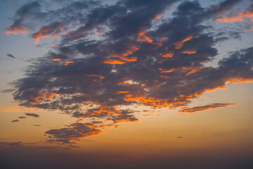 The fiery sky at Grove Beach in Kovalam in Asia, India, Kerala, Kovalam, in summer on a sunny day.