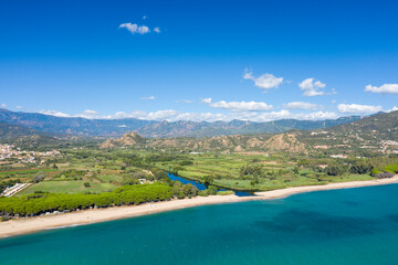 The sandy beach in Lotzorai in Europe, Italy, Sardinia, Lotzorai, in summer, on a sunny day.