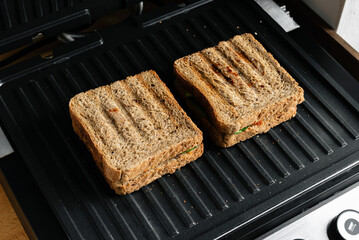 Delicious sandwiches on a contact grill
