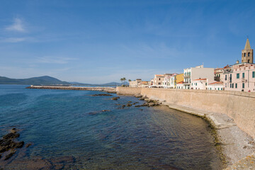 Fototapeta premium The fortifications at the seaside in Alghero in Europe, Italy, Sardinia, Alghero, in summer, on a sunny day.