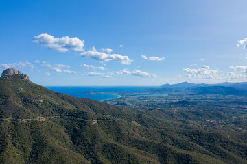 Fototapeta premium The mountain and the sea between Baunei and Dorgali in Europe, Italy, Sardinia, Baunei, in summer, on a sunny day.