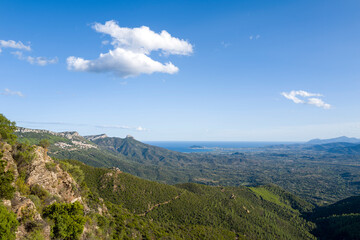 Naklejka premium The mountain and the sea between Baunei and Dorgali in Europe, Italy, Sardinia, Baunei, in summer, on a sunny day.