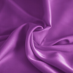 photo of violet silk fabric template of fabric roll of fabric