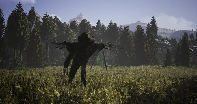 A scarecrow looms in the foreground of a vast field, surrounded by lush green grass and towering trees.