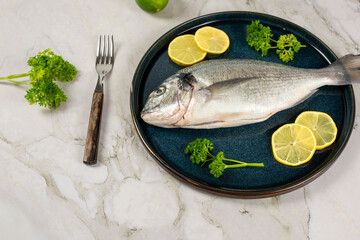 sea bream fish with lemon slices