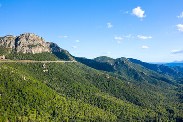 The road in the Sardinian countryside between Baunei and Dorgali in Europe, Italy, Sardinia,...