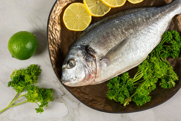 sea bream fish with lemon slices